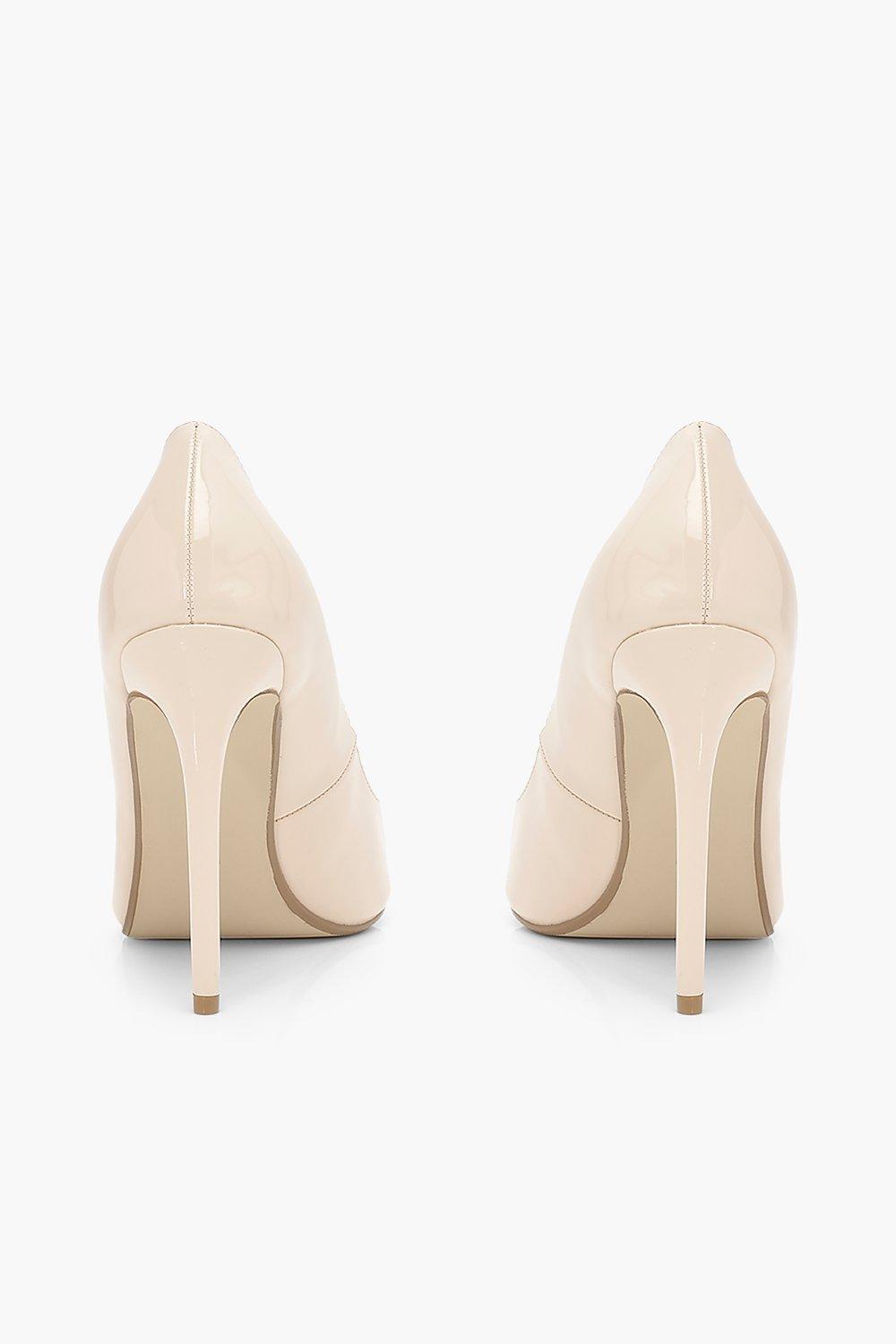 Scarpe decollete a punta con tacco alto
